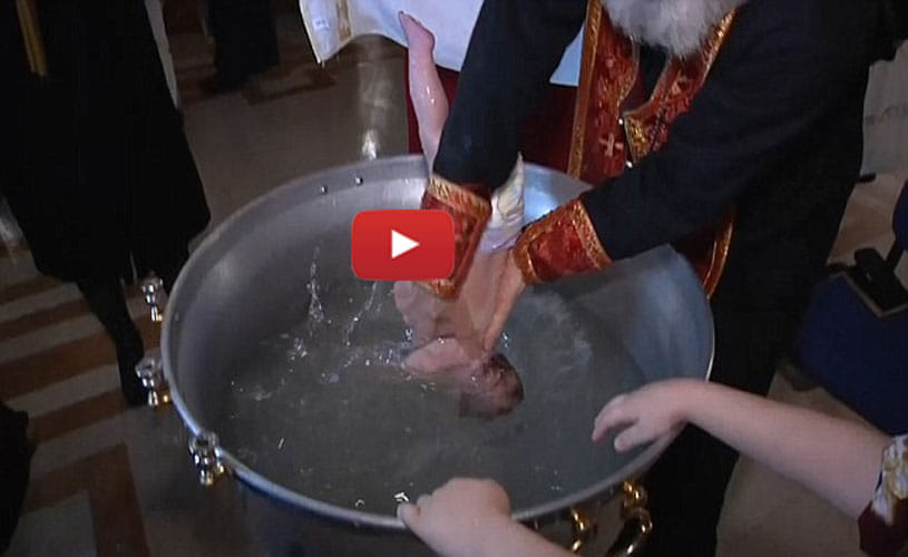 Patriarch of Church dunks babies roughly underwater