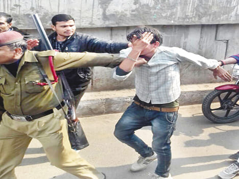 Bank guard nabbed the suspected man beaten by mob