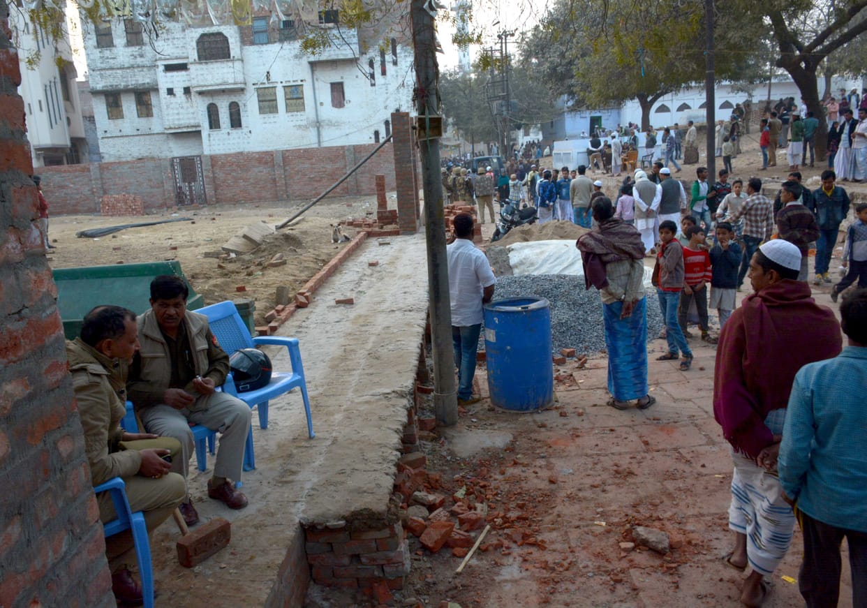 Cemetery panchayat land organically, assault-stoned