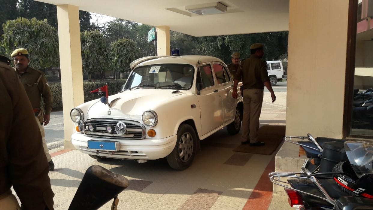 Varanasi DIG without number were walking by car
