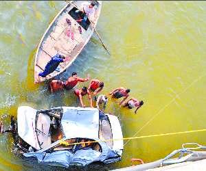 Car crashes into river, including youth, death
