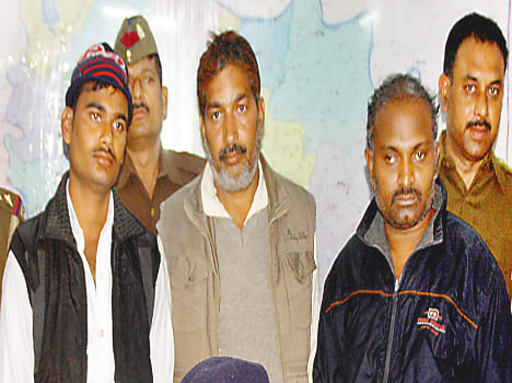 Three arrested, including 73 cases of alcohol and equipment