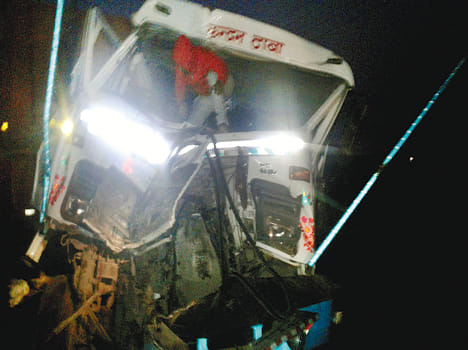 Trola rammed into the truck parked, driver injured