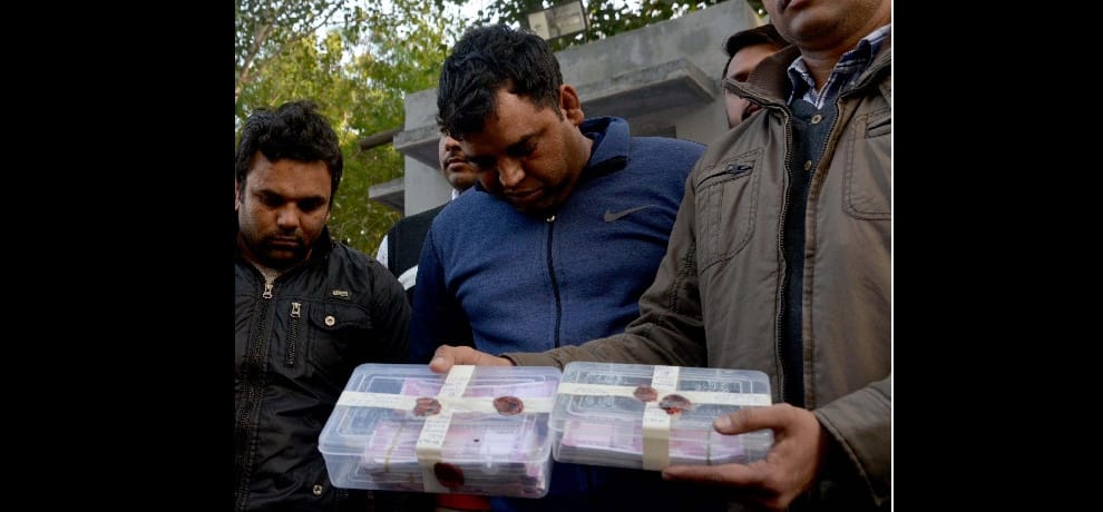 Scanning printed 18 million of the notes, three arrested