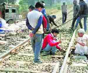 Truck fell on crossing, trains delayed