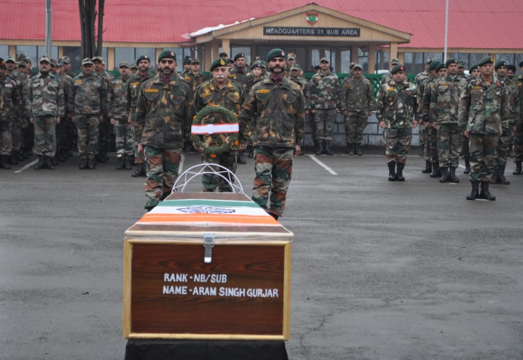 MARTYRS BID FAREWELL IN SOLEMN CEREMONY