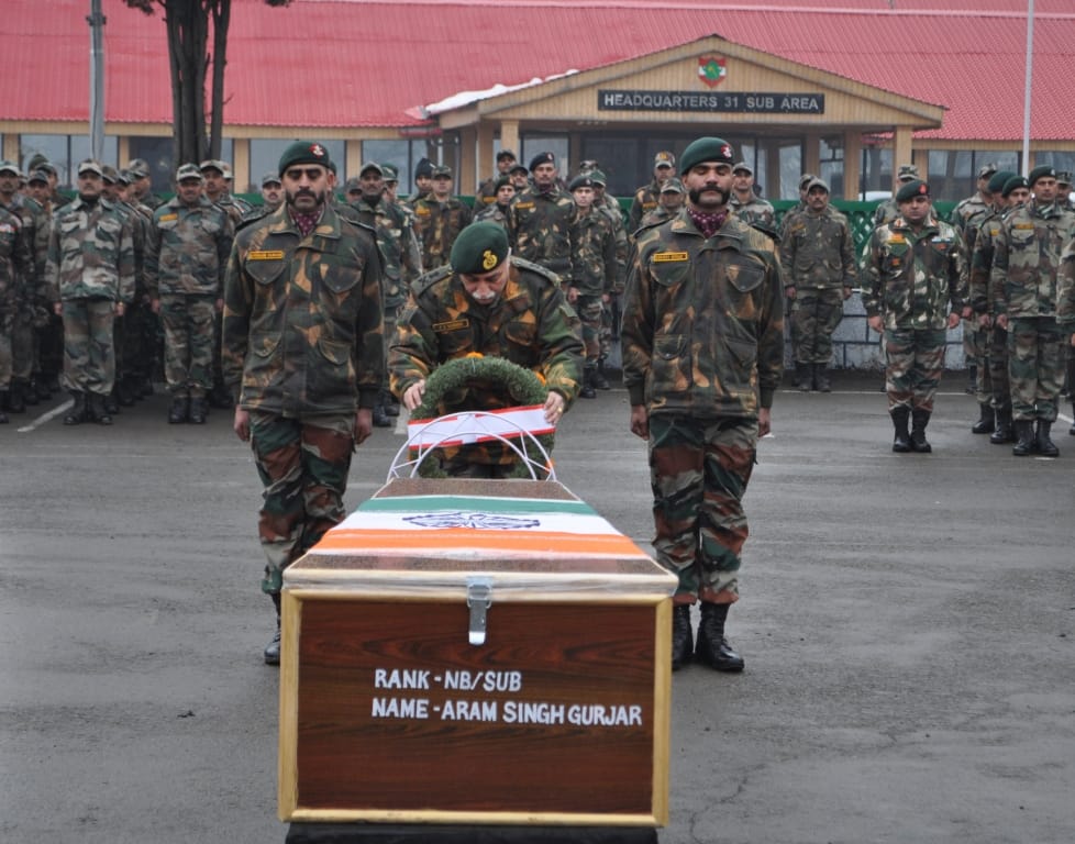 MARTYRS BID FAREWELL IN SOLEMN CEREMONY