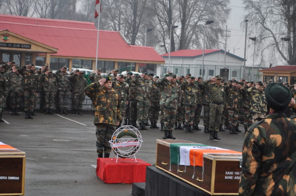MARTYRS BID FAREWELL IN SOLEMN CEREMONY
