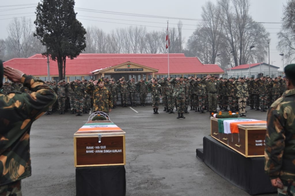 MARTYRS BID FAREWELL IN SOLEMN CEREMONY