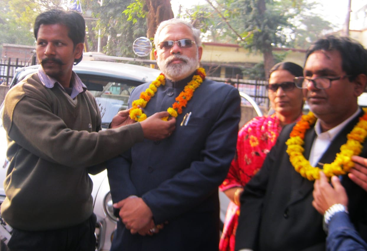  Surprised people looking at Modi lookalike