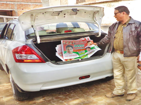 Bhojpur SP candidate got in the car's promotional materials