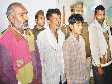 With artillery, including a father and son caught four