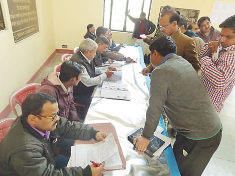 graduate, teacher Voting for the Legislative Council today 