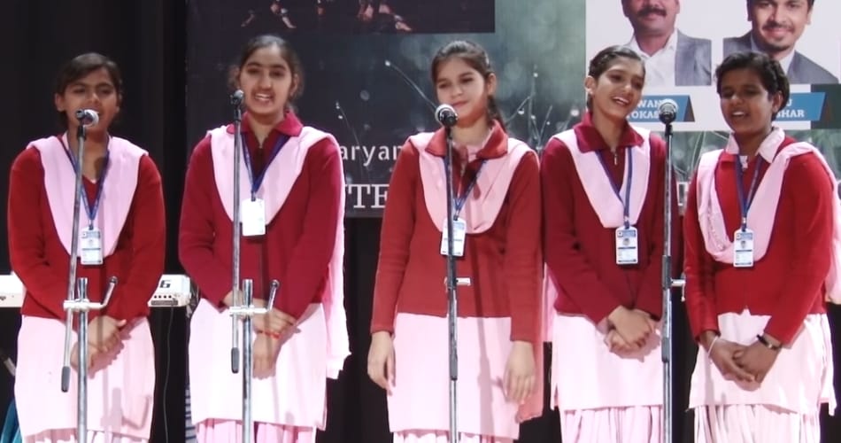 Education deputy director awarded singer students in school