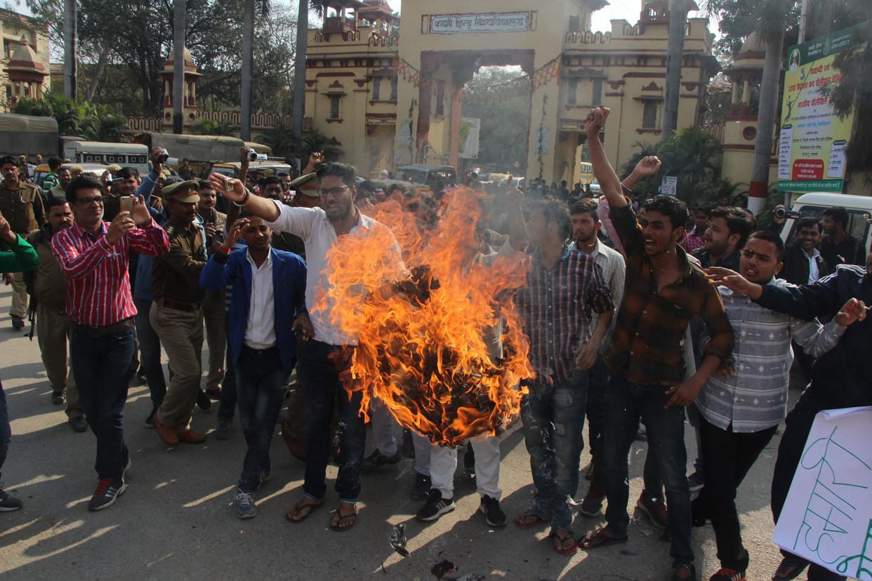bhu student  Burnt effigies of jnu professor