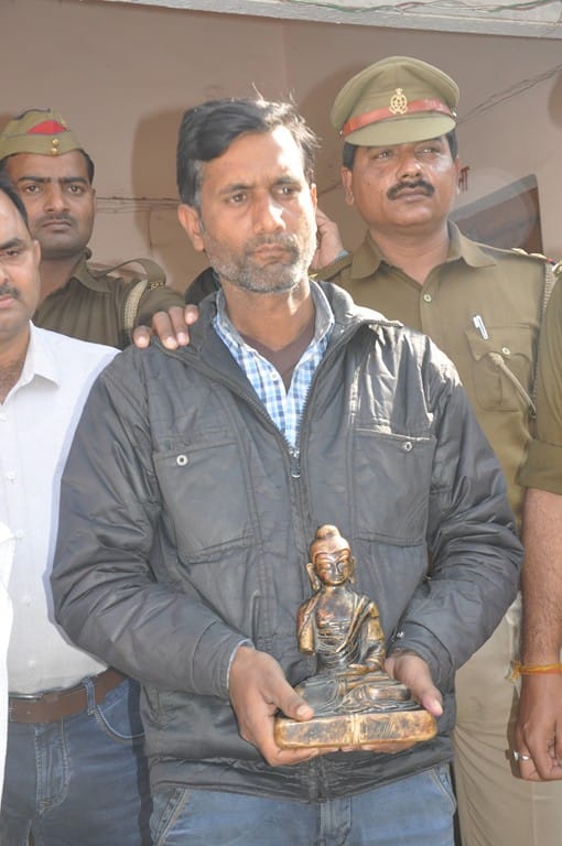 Police arrested to a theif with metallic statue of Lord Buddha