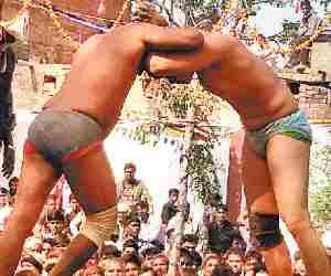 Surjit wins wrestling 