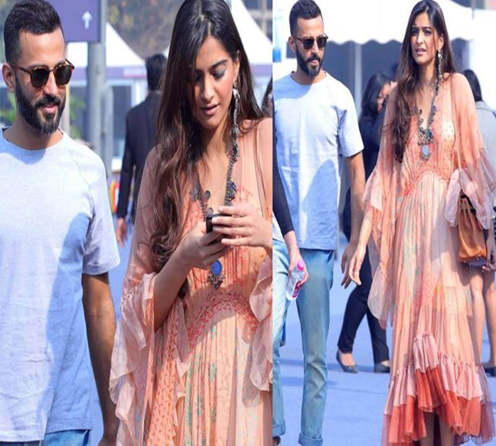 sonam kapoor and anand ahooja spotted at art fair in delhi