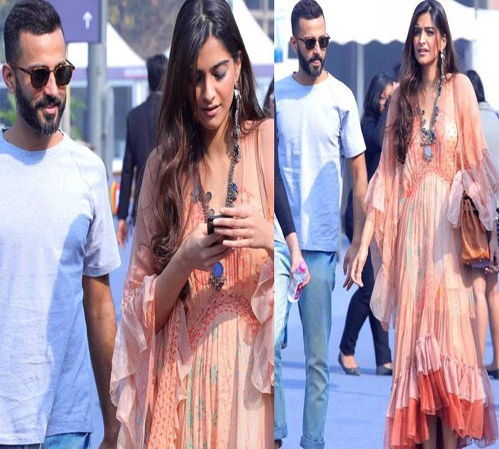 sonam kapoor and anand ahooja spotted at art fair in delhi
