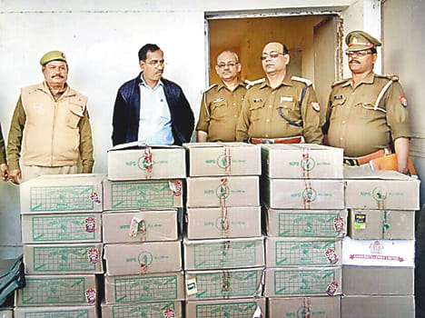 By raiding the liquor seized 44 boxes