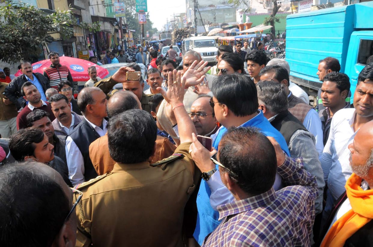 BJP city president in custody, police station commotion