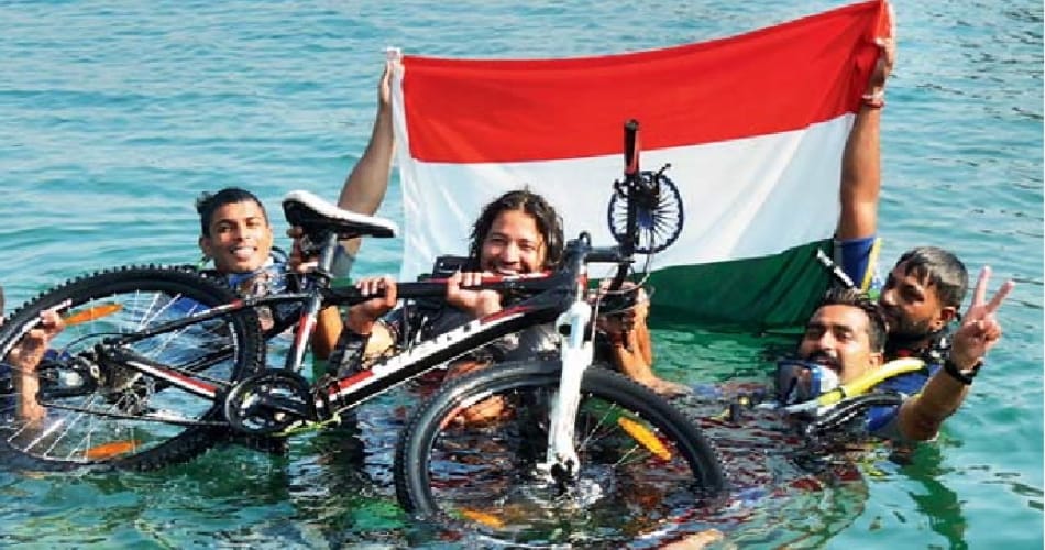 unique sikh boy, inspector daljinder singh drives cycle under 30 feet in sea at karnataka