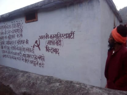 maoists written slogan on temple wall