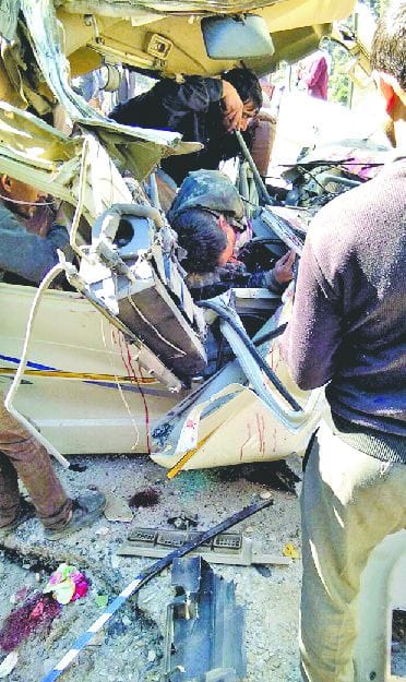 Two killed in bus and winger clash, 16 injured