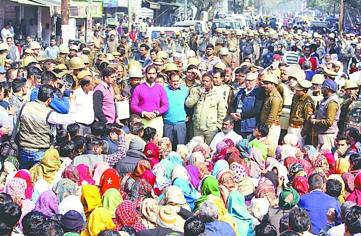 Blocking traffic on streets protesting jaji