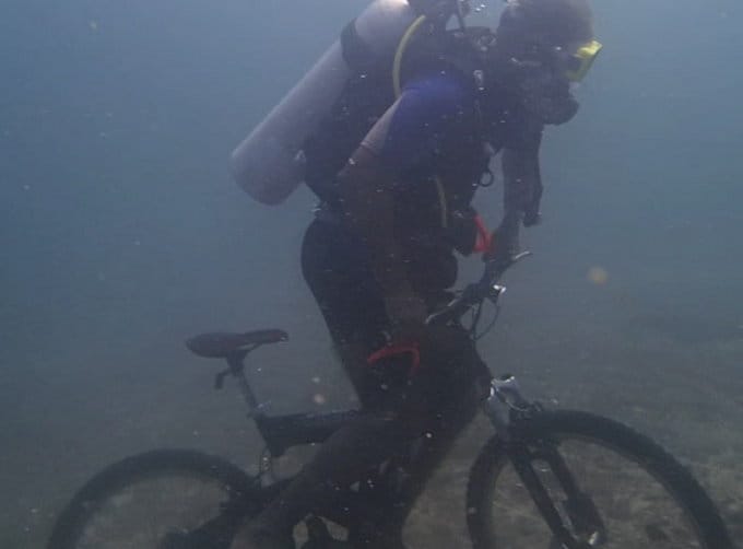 unique deed by chandigarh police incpector daljinder singh drives cycle under 30 feet in sea 