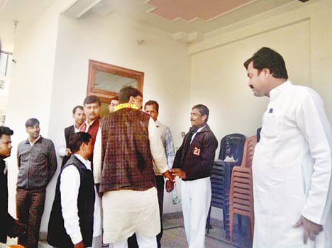 Seeking votes stormed the home of party leader leader