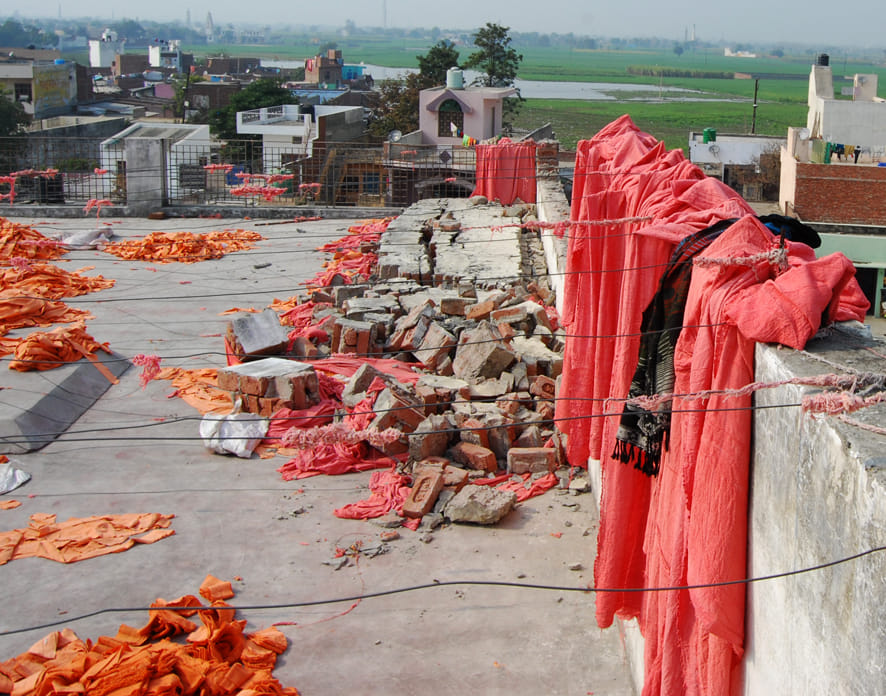 To the wall of the factory, two women injured