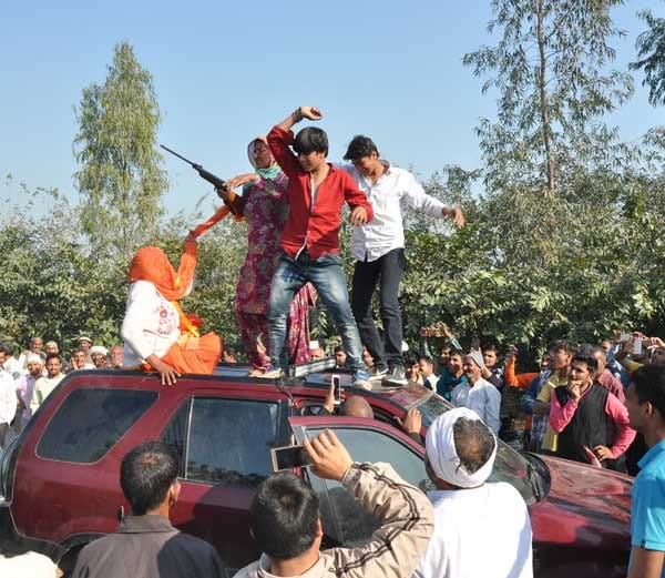 dance with rifles on haryana jat reservation protest place at rohtak of haryana