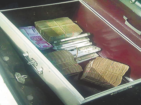 Holding ten lakh in car