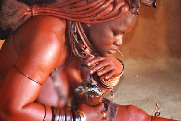 The Himba Tribe Woman take bath only once in life but they are known for their beauty.