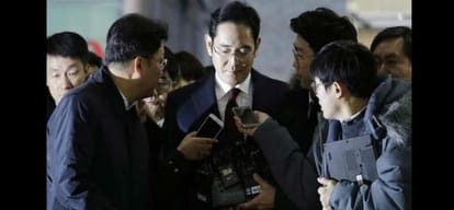 samsung chief to be charged with bribery and embezzlement amid corruption scandal