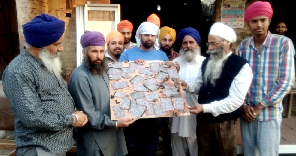 discourtesy of holy book tarantaran of punjab