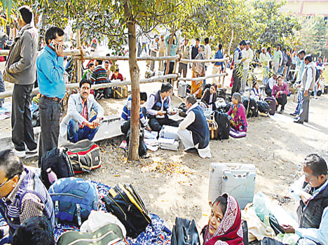 Amid tight security, polling parties left