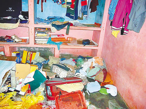 Teacher's home robbed, shot four
