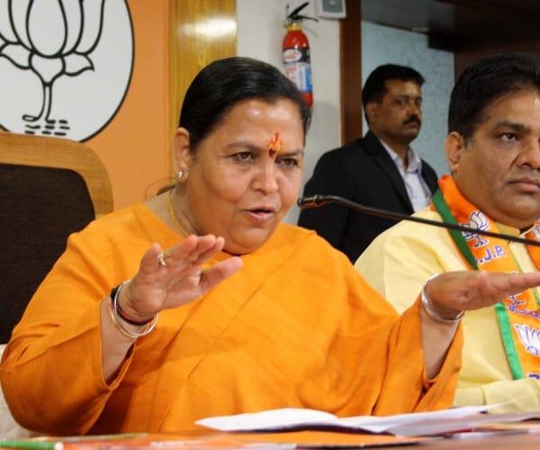  uma bharti promises to clean river ganga.