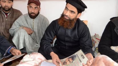 Until the judge sat, he reading the Quran