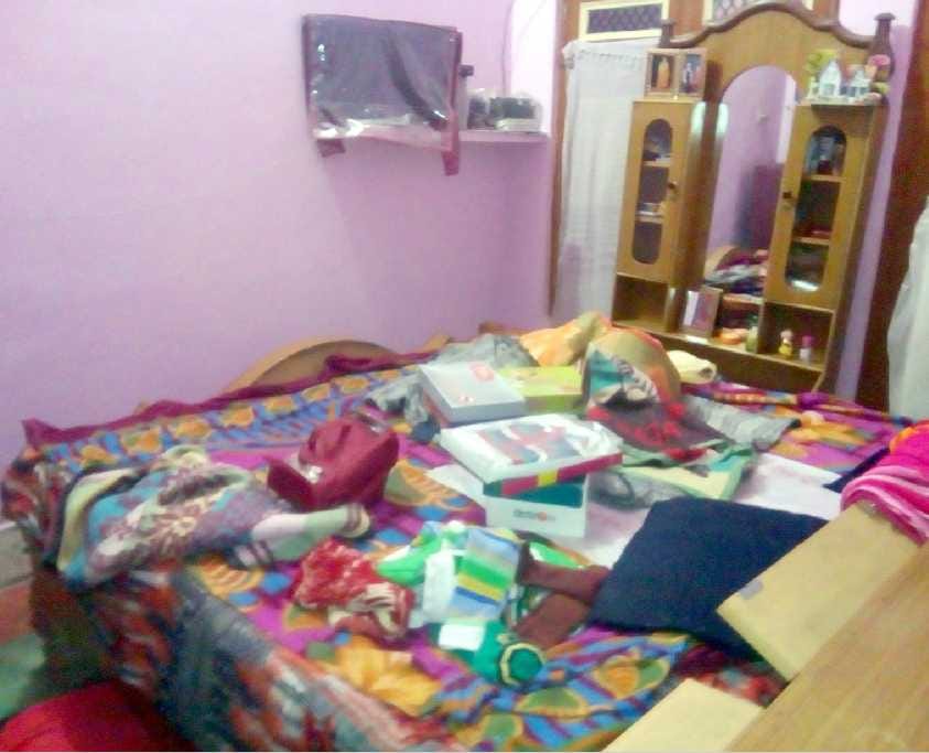 assault on couple and son with a knife, looting