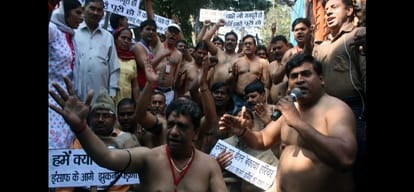 Corporation personnel at the Delhi Secretariat perform topless