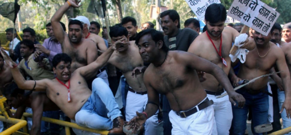 Corporation personnel at the Delhi Secretariat perform topless