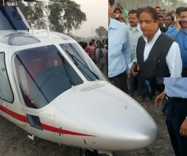  azam khan helicopter landed in a field.