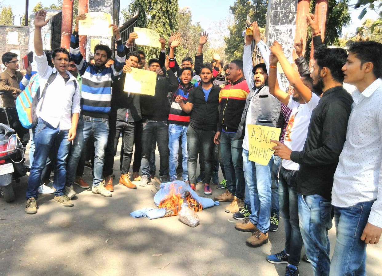 College on anti-state slogans effigy.