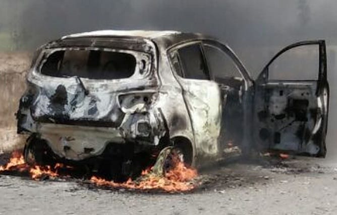 Car burnt in sitarganj