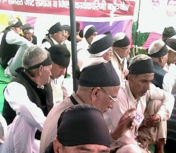 jat agitators celebration black day and sitting on protest place in black dresses at rohtak