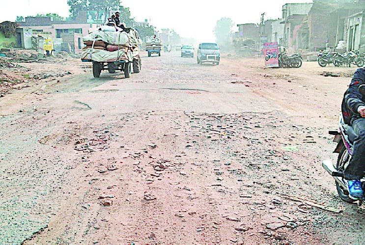 A puff of dust and battered highway