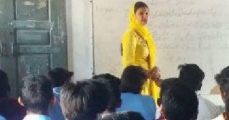 no english teacher in school, lady sarpanch sunita teaching en glish to students